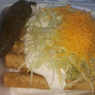 Rolled tacos were good, but they charge .50 cents for using card, but charged me .84 cents wonder how many people they do this too.