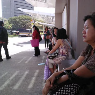 No fence! So there's no where for people to fight for first in line status.LOL! Love the shaded shelters!