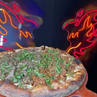 Al pastor pizza and asada pizza