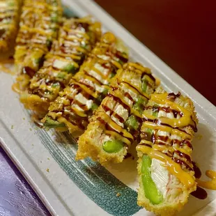 a plate of sushi on a table