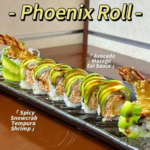 a long sushi roll with shrimp and avocado