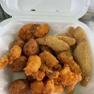 Fried Perch, hush puppies and 8 shrimp.