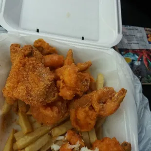 Catfish tasted good the shrimp did also the fries was okay i dont like fries that much lemon and Cajun seasoning