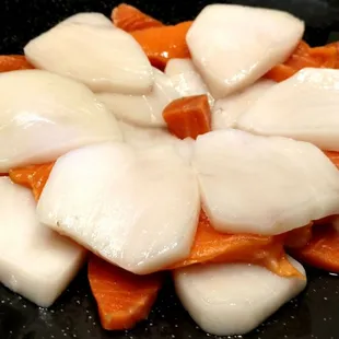 Made a sashimi flower with Alaskan Pride sockeye salmon, escolar and king salmon (Who says you can&apos;t play with your food?)