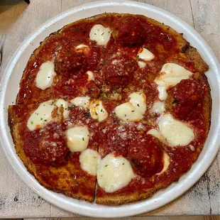 Meatball pie (chicken meatballs on a cauliflower crust)