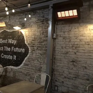 Wall paint on the left outdoor seating area