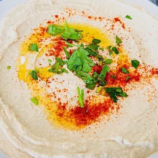 a plate of hummus