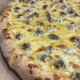 Take your pizza to the next level with our rich and savory garlic parmesan sauce, available as a delicious base for your custom pizza.