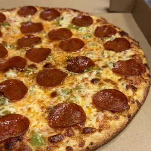 Our thin crust is hand-rolled from scratch and crafted to perfection, offering a delightfully crispy texture.