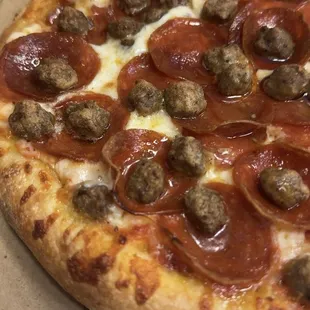 Indulge in our massive Monster Slice deal, featuring a generous 10-inch pizza paired with a refreshing can of soda, all for just $10.