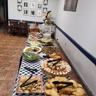 a long table full of food