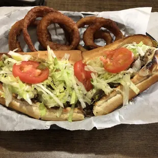 two hotdogs and onion rings