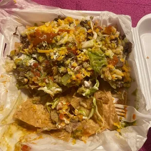 There food is expensive and not so good there skimpy with there meat I ordered a supreme carné asada nachos just beans tomatoes and cheese