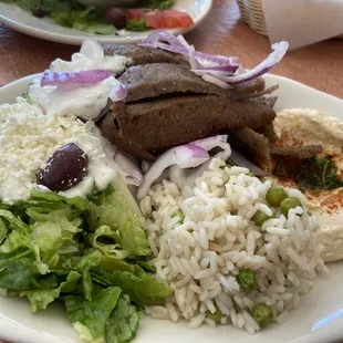 Gyro Plate with feta salad, hummus, and rice pilaf.