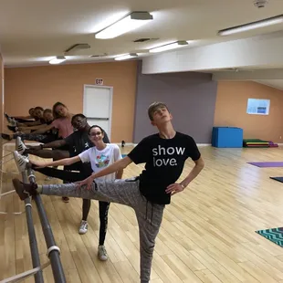 At Albedo Arts academy in cardio hip hop class doing stretches