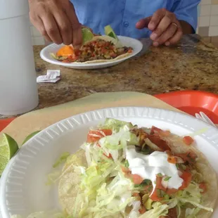 Fish taco for me 2 carne asada for he