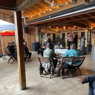 a group of people sitting around a table