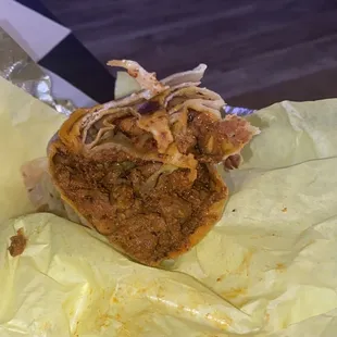 Adobada Burrito supposed to have guacamole &amp; pico. All meat burrito which was not even good, it was like drenched in pure salt