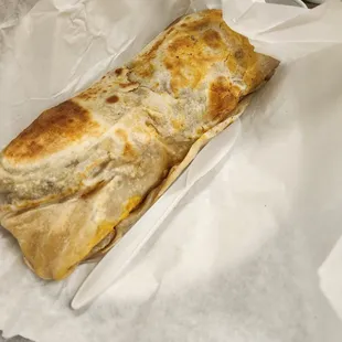Breakfast burrito, knife for scale