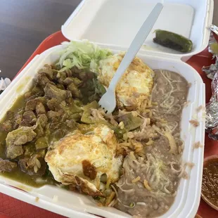 Green Chilaquiles with pork chili Verde on top