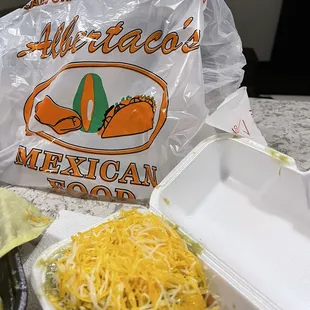 3 Rolled Tacos with Guacamole and Cheese