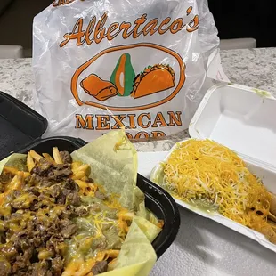 My late night Uber Eats order - carne asada fries (wrong order) and 3 rolled carne asada tacos
