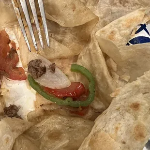 a plate of tortillas and a fork