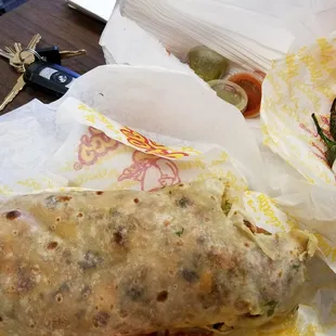 they don't always get the guacamole and pico de Gallo spread evenly. But when they do is juicy and delicious. GRILLED CHICKEN BURRITO