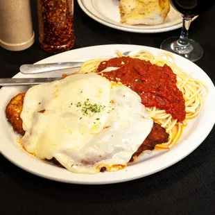 Albertos Pizzeria Italian Restaurant&apos;s Spaghetti with Chicken Parmigiana.