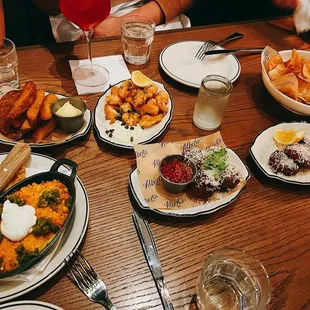 spinach artichoke dip, wedges, monkfish, arancini, cacio e pepe, salt and vinegar chips