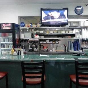 The coffee counter at Alberts is a good place to stop for a cup and see some familiar faces!