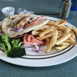 Grilled Greek Chicken platter with fries