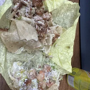 7 tiny pieces of shrimp and all tortilla and batter to the left
