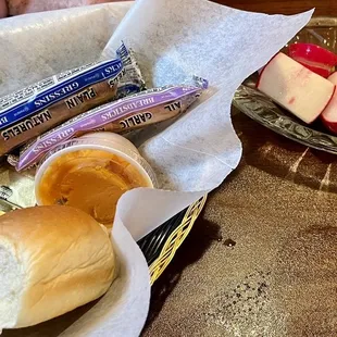 Relish tray, cheese spread, breadsticks, rolls