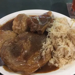 Pork steak, sauerkraut and potato dumpling dinner. Yum!