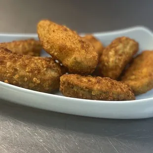 a bowl of fried tater tots