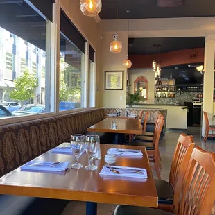 a restaurant with tables and chairs