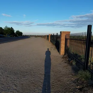 My shadow and i going on a 3-mile walk at The Academy