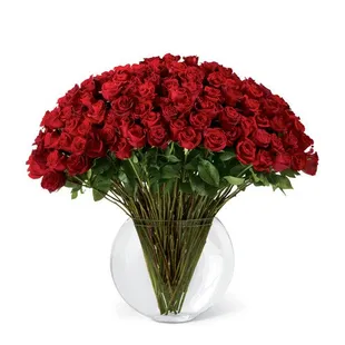 Sweep them off their feet with 100 stems of our premium long-stemmed red roses.