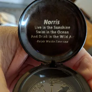 Engraved compass lid