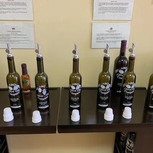 bottles of olive oil on a shelf