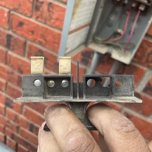 Broken terminal handle from disconnect box