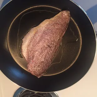 This is my red snapper filet. I'm going to fry it in a light oil.