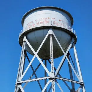 Water tower with writing from indigenous occupation