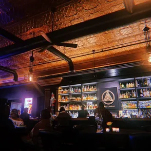 people sitting at a bar