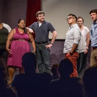 a group of people on stage