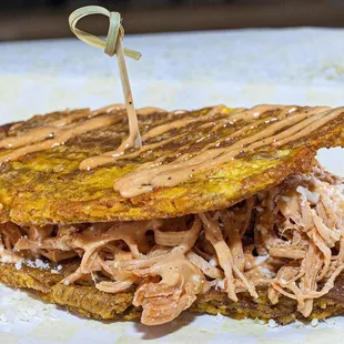 Patacón del Lago ( shredder chicken and cheddar cheese)