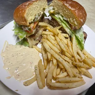 a hamburger and fries on a plate