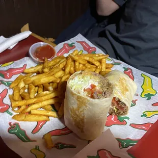 Supreme beef burrito with seasoned fries.