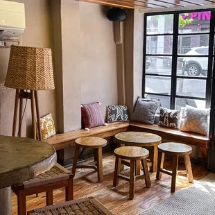 a living room with wooden furniture